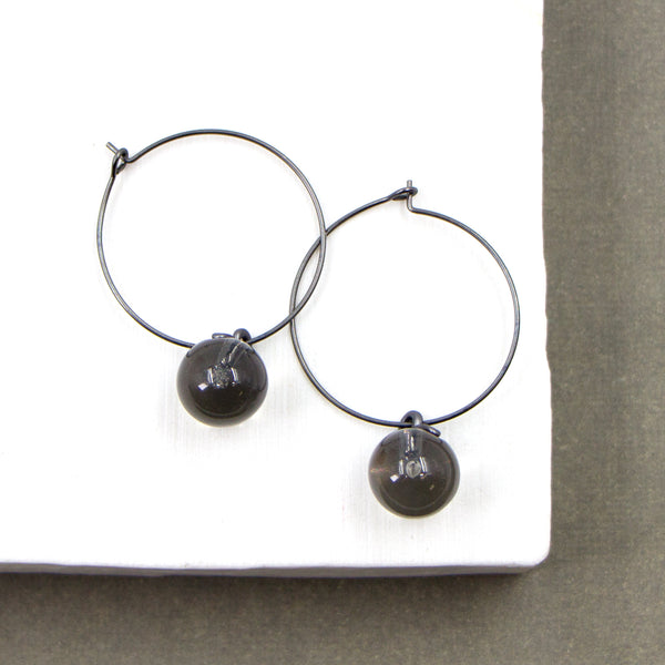 Fine hoop and resin ball contemporary earrings