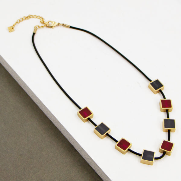 Contemporary square resin inlay components on rubber necklace