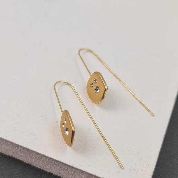 Organic shape earrings with embedded crystals and contemporary hooks