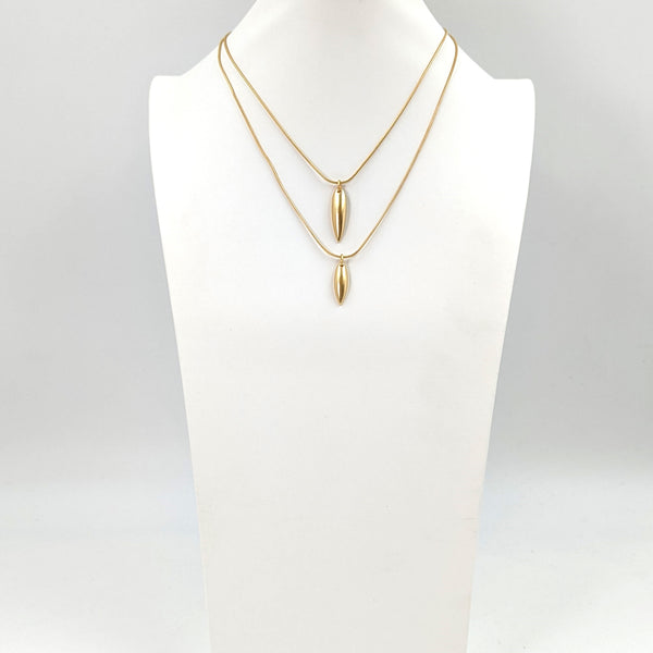 Double layer necklace with mini horn-like component