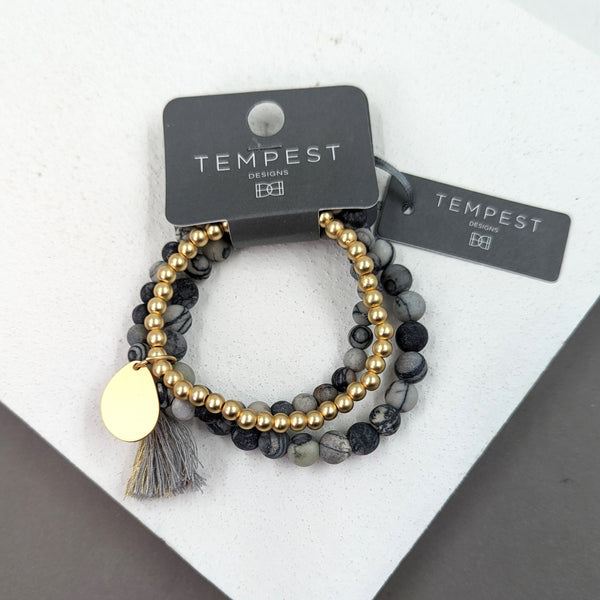 Multi strand beaded semi-precious bracelet with tassel