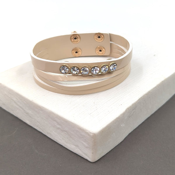 Multi leather strand bracelet w/ crystal feature