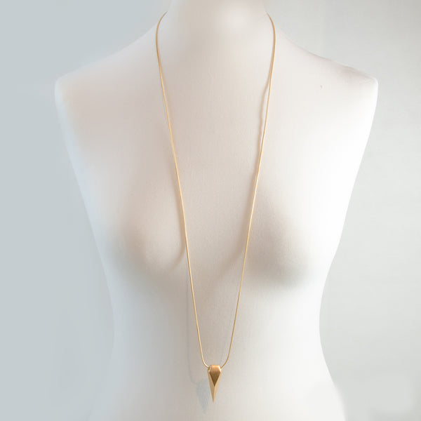 Long snake chain necklace with geometric shaped pendant
