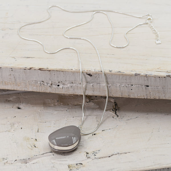 Long chain necklace with resin pebble shaped pendant