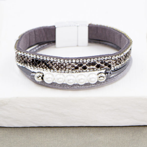 Multistrand PU bracelet with real pearl feature