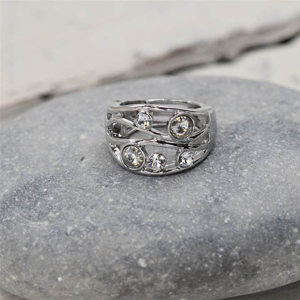 Stretchy rhodium ring with crystal stones