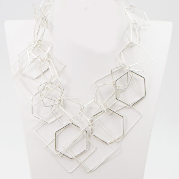 Open geometric shapes statement necklace