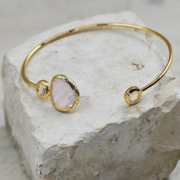 Organic open bangle with facetted pink opal stones