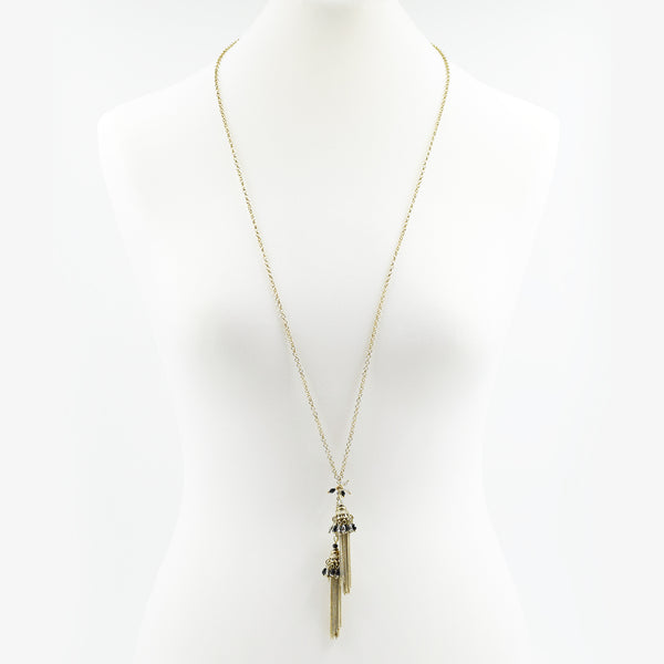 Long necklace with twin tassel pendants with crystals