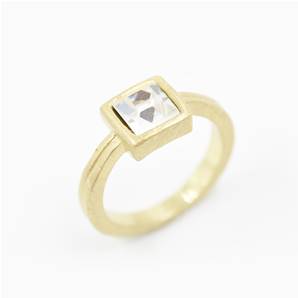 Princess style crystal solitaire ring with band detail