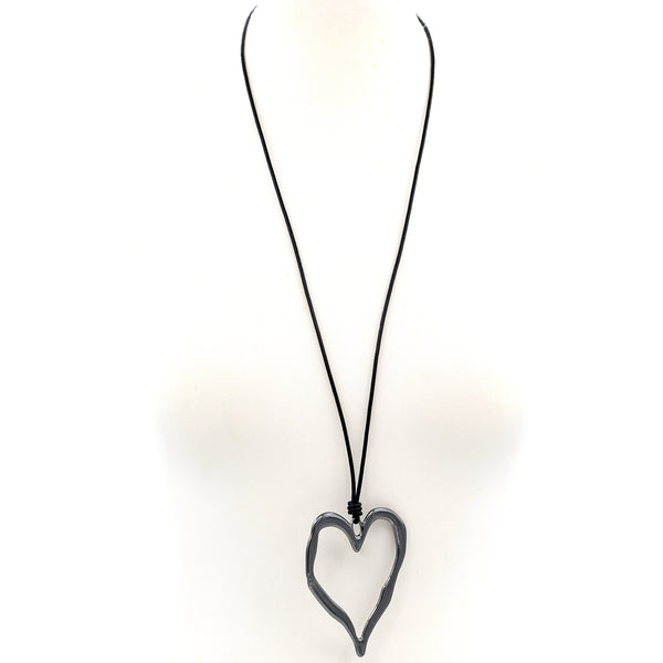 Beaten metal heart on simple long leather necklace