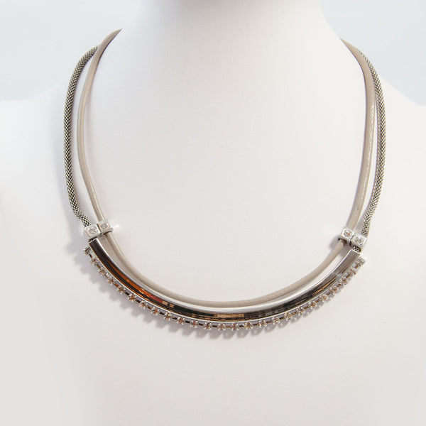 Statement crystal necklace on short leather and mesh chain