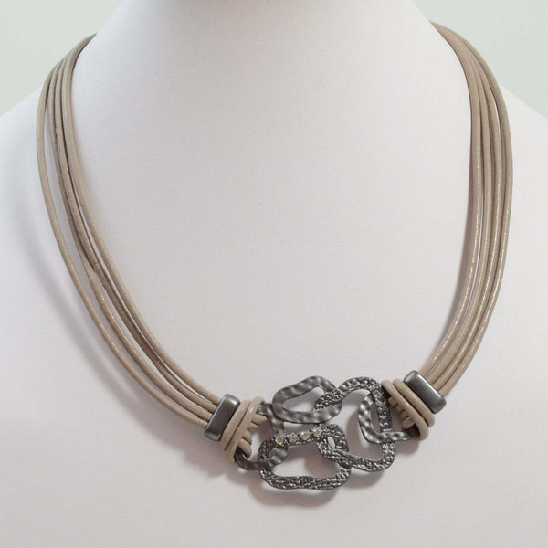 Interlinked organic circles feature on leather necklace