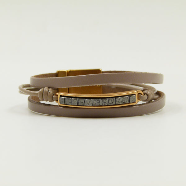 Feature bar with metal inlay on leather bracelet w/mag clasp
