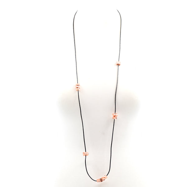 Multi shape beaten effect nuggets on long leather necklace